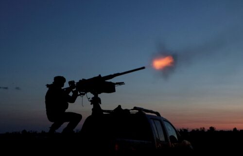 A Ukrainian Armed Forces serviceman fires a machine gun towards a Russian drone in the Kharkiv Region of Ukraine on June 2.